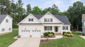 Follow the Water: How Gutters Protect Landscaping and Outdoor Features
